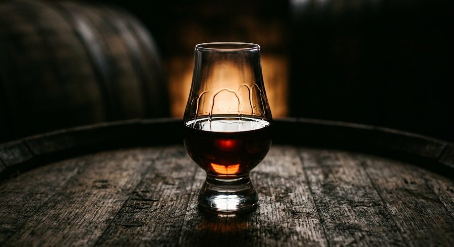 A neat pour of Michter's 20 Year bourbon in a Glencairn glass