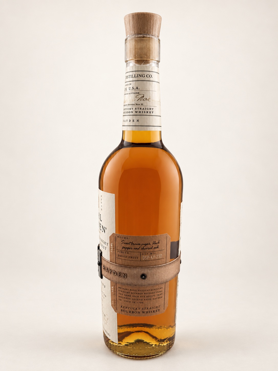 Side of the Basil Hayden bottle showing the printed notes panel and band